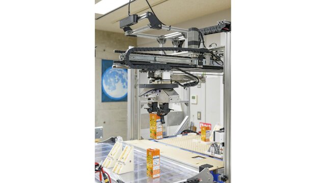 「上から商品を掴む」という特徴を持つロボットの画像2